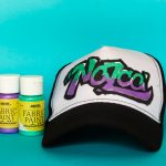 Cap with paint cans